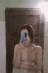 Con đĩ Phương Thuỳ 2008 nứng lồn cởi áo chụp vú cho trai xem